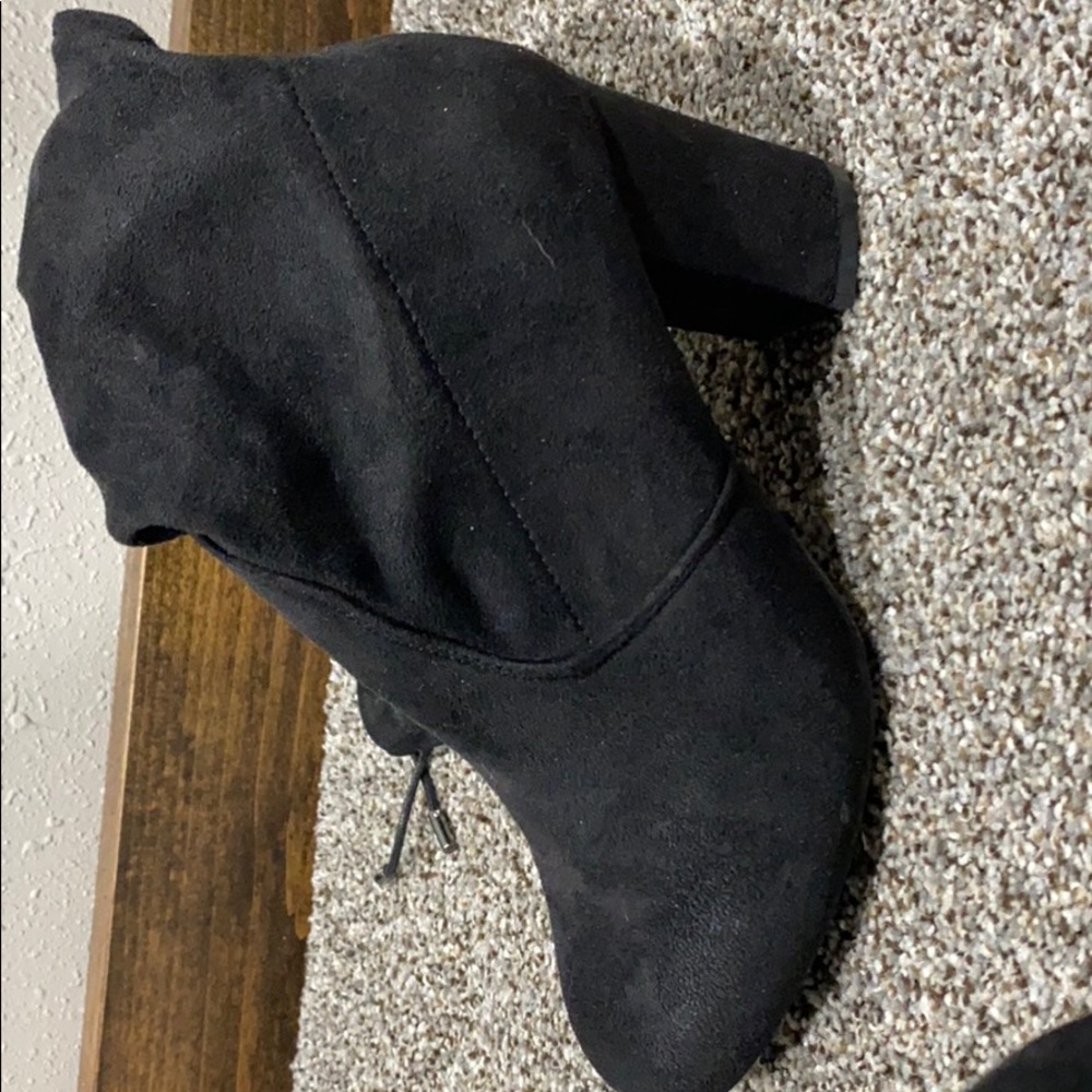 Knee high heeled boots